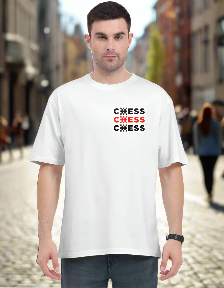 Model wearing a Chess AOP oversized tee in white, featuring a bold chess design on the front.